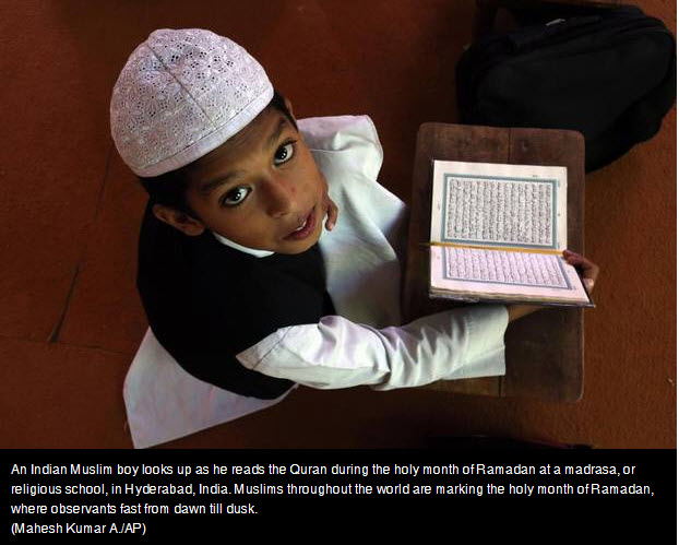 Child reading Koran